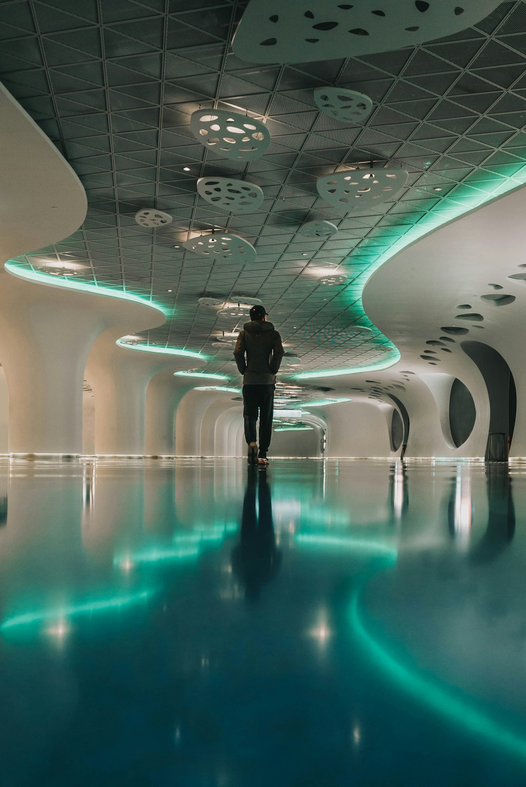 Person walking through museum interior
