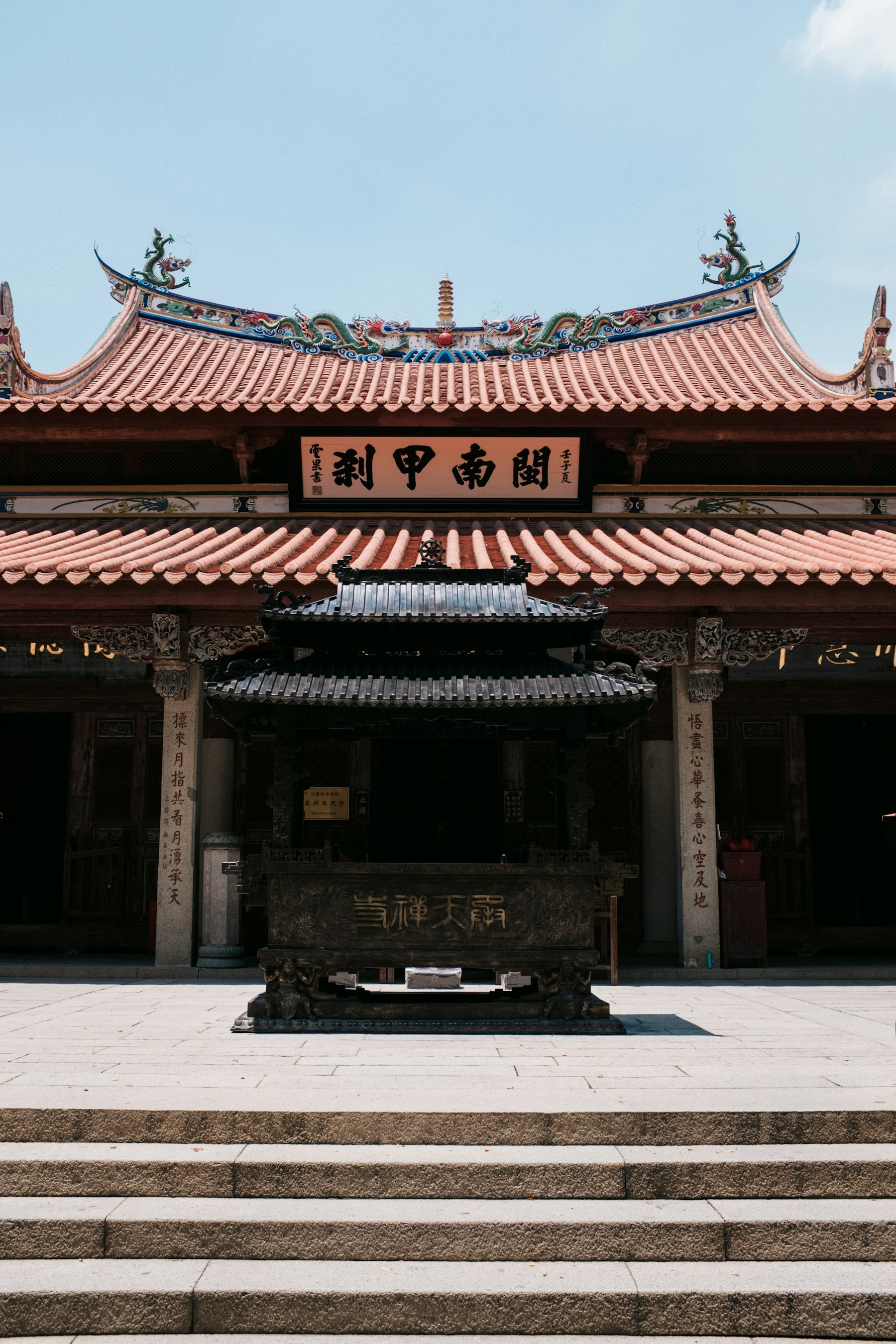 Southern Fujian temple with curved red-tile roof