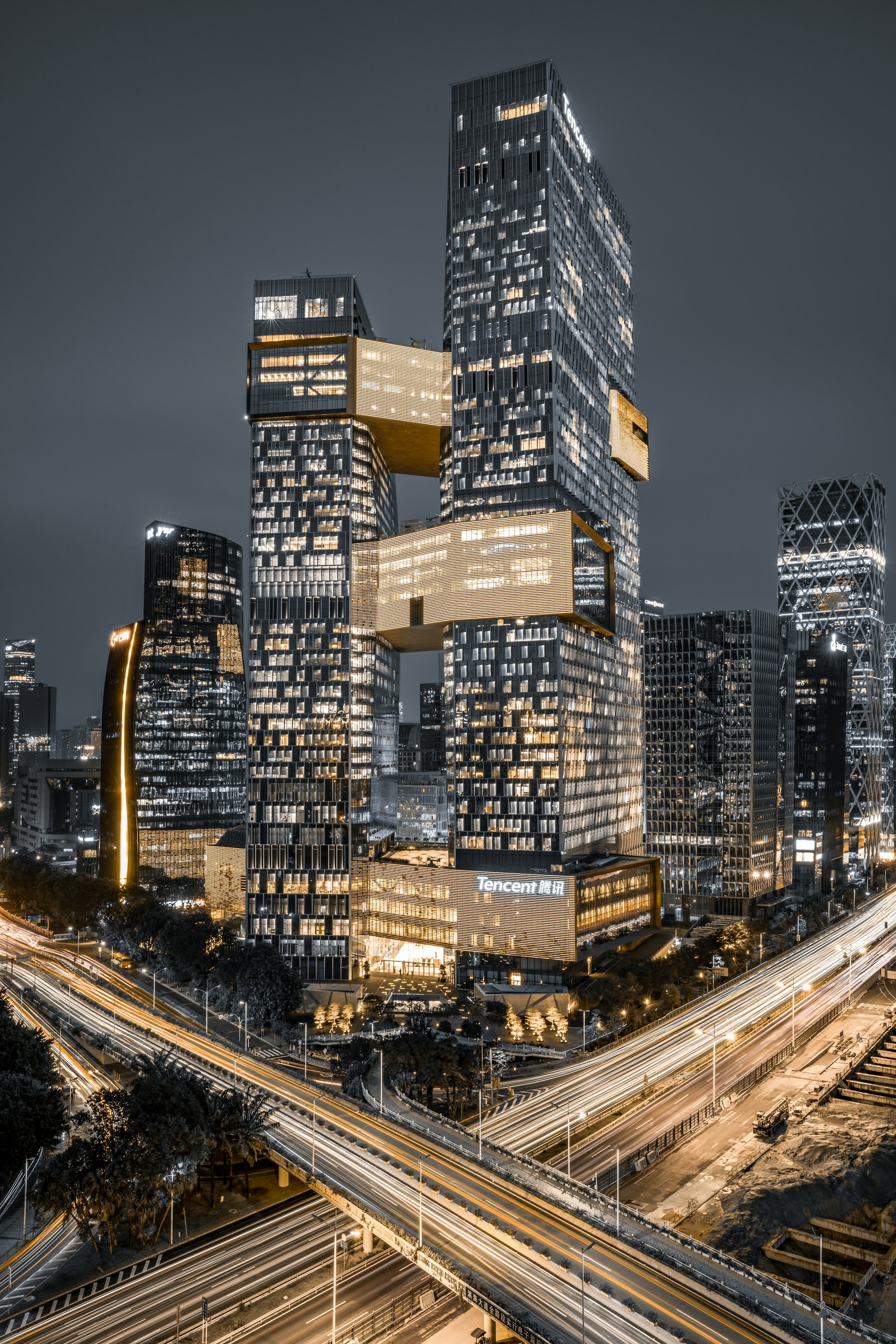 Tencent headquarters towers lit up at night in Shenzhen